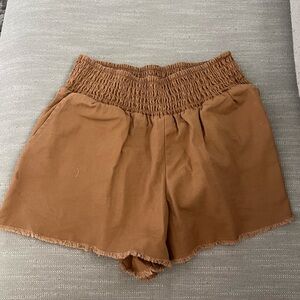 brown shorts